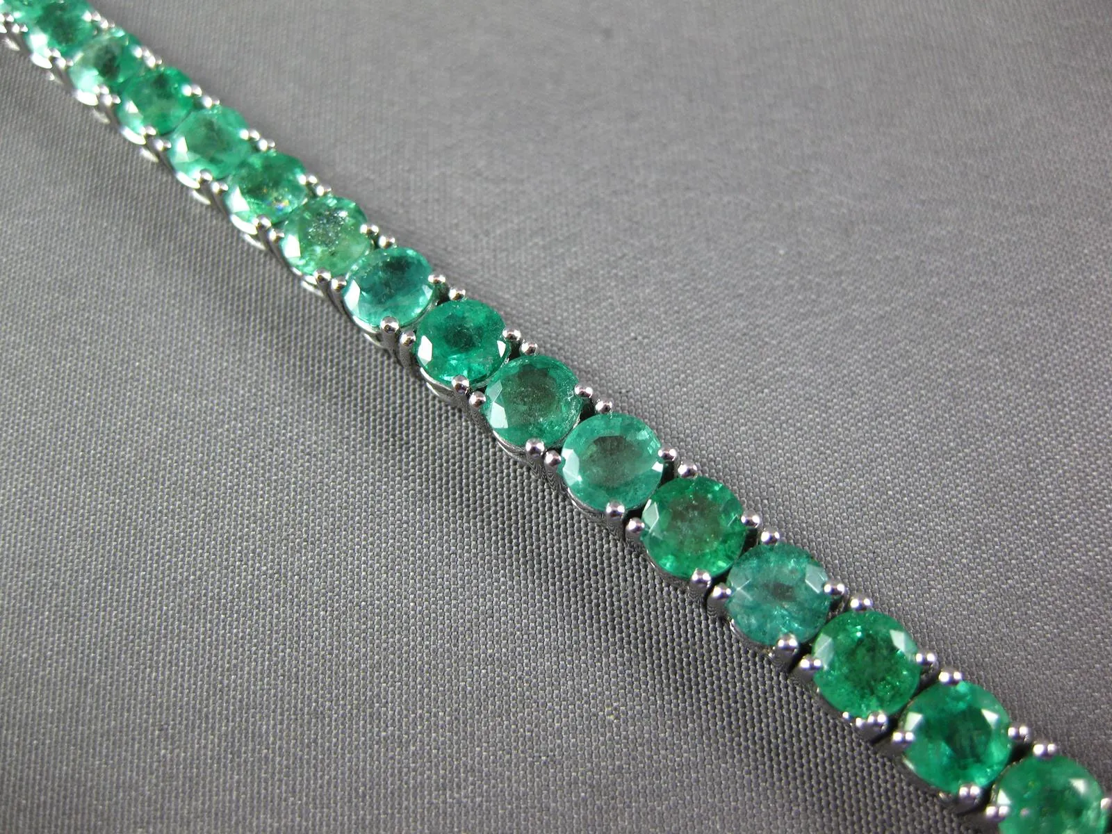 ESTATE LARGE 12.13CT AAA EMERALD 18KT WHITE GOLD 3D ROUND TENNIS BRACELET