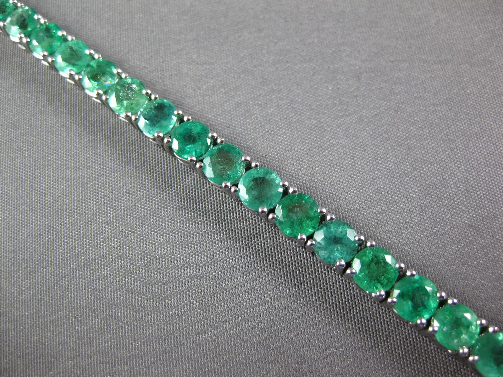 ESTATE LARGE 12.13CT AAA EMERALD 18KT WHITE GOLD 3D ROUND TENNIS BRACELET