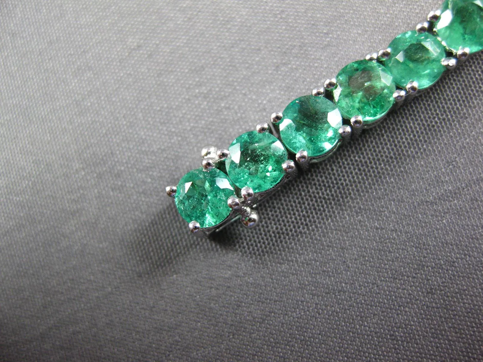 ESTATE LARGE 12.13CT AAA EMERALD 18KT WHITE GOLD 3D ROUND TENNIS BRACELET