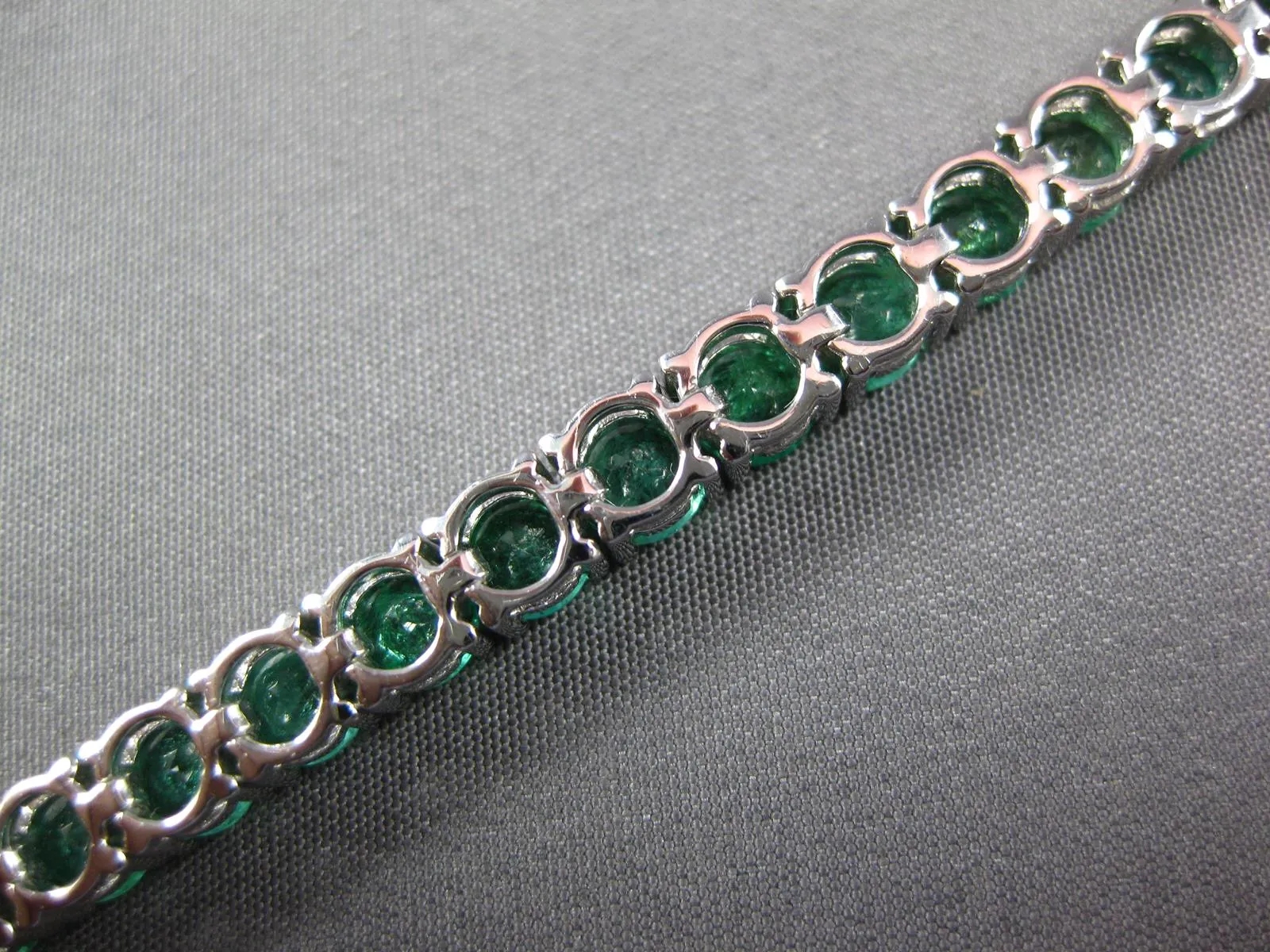 ESTATE LARGE 12.13CT AAA EMERALD 18KT WHITE GOLD 3D ROUND TENNIS BRACELET