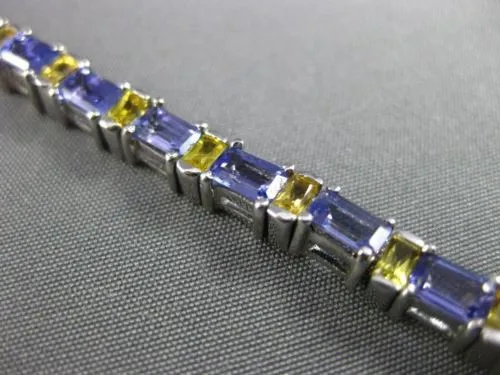 ESTATE WIDE 7.04CT TANZANITE & YELLOW SAPPHIRE 18KT WHITE GOLD TENNIS BRACELET