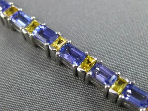 ESTATE WIDE 7.04CT TANZANITE & YELLOW SAPPHIRE 18KT WHITE GOLD TENNIS BRACELET