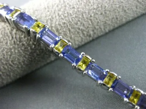 ESTATE WIDE 7.04CT TANZANITE & YELLOW SAPPHIRE 18KT WHITE GOLD TENNIS BRACELET