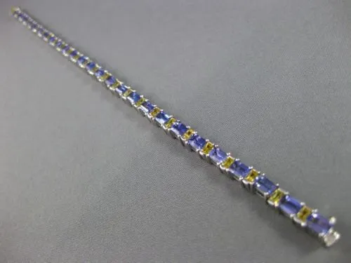 ESTATE WIDE 7.04CT TANZANITE & YELLOW SAPPHIRE 18KT WHITE GOLD TENNIS BRACELET