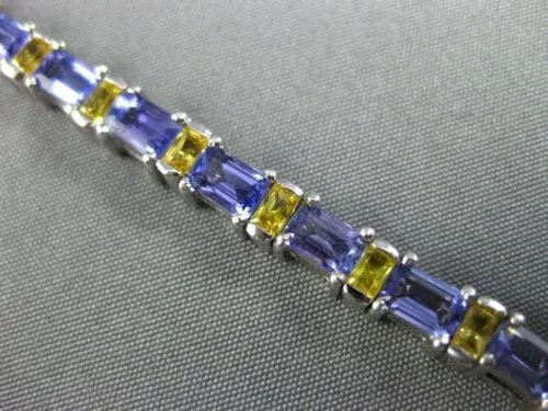 ESTATE WIDE 7.04CT TANZANITE & YELLOW SAPPHIRE 18KT WHITE GOLD TENNIS BRACELET