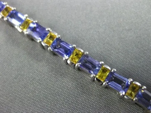 ESTATE WIDE 7.04CT TANZANITE & YELLOW SAPPHIRE 18KT WHITE GOLD TENNIS BRACELET