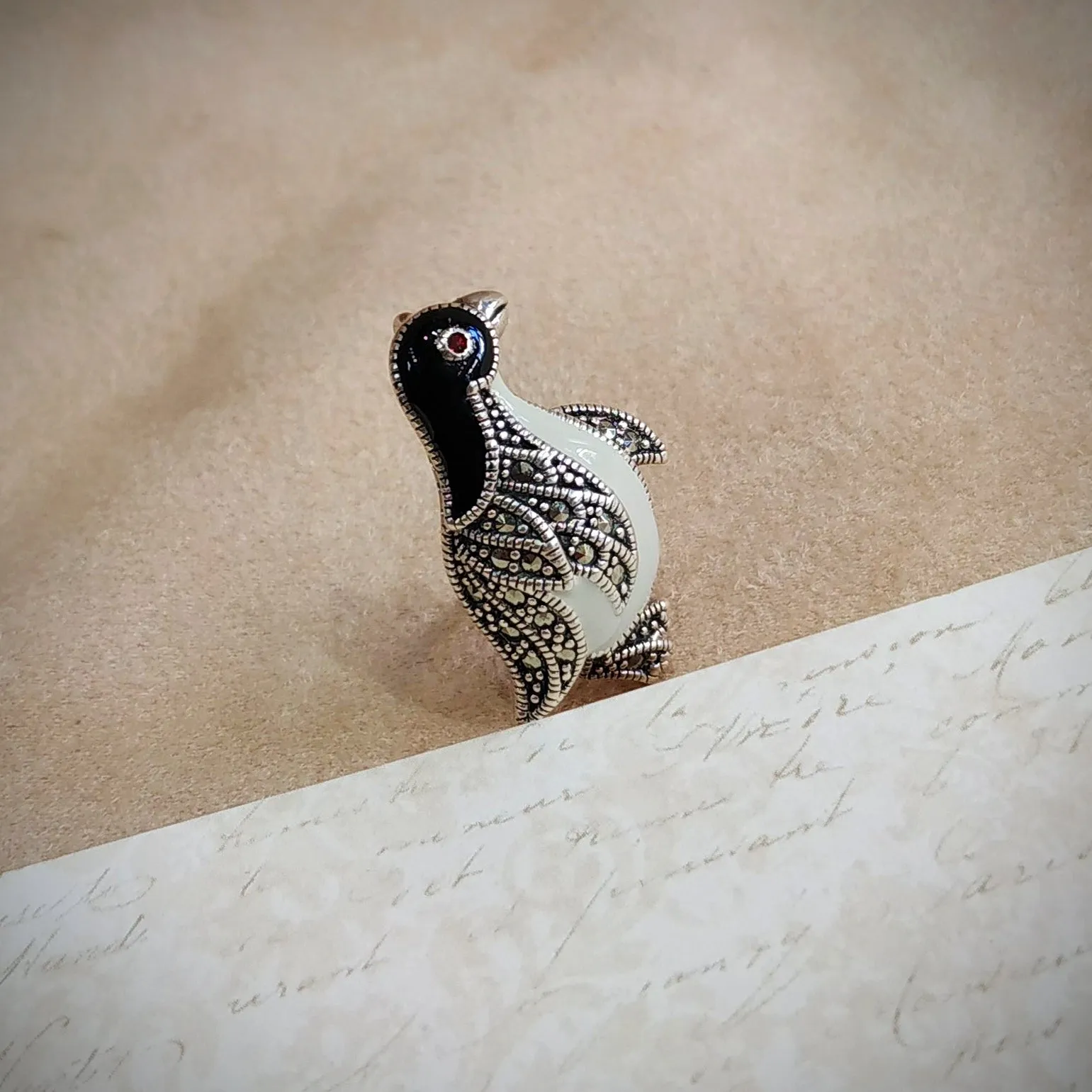 Silver enamel penguin brooch